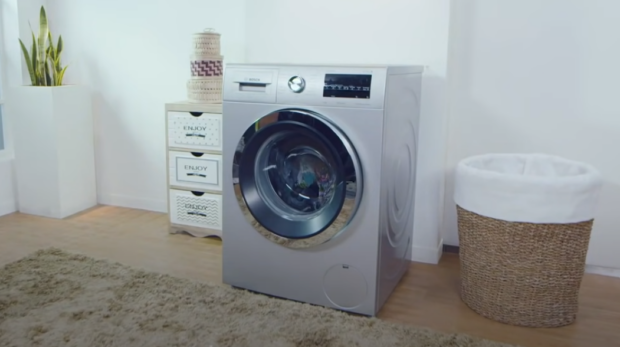 Silver Washing Machine in House