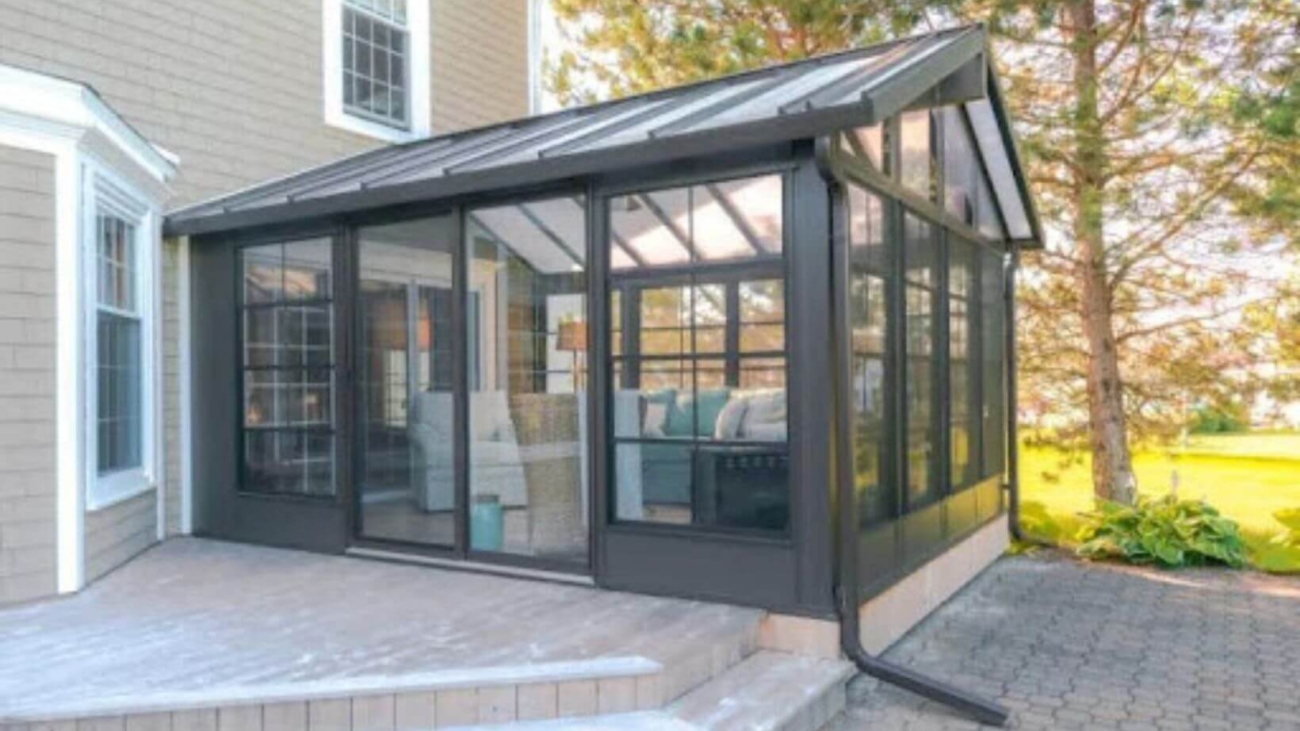 Stylish 3-season sunroom with a sturdy aluminum frame and expansive windows.