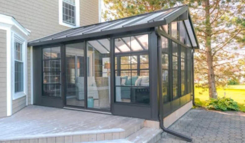 Stylish 3-season sunroom with a sturdy aluminum frame and expansive windows.